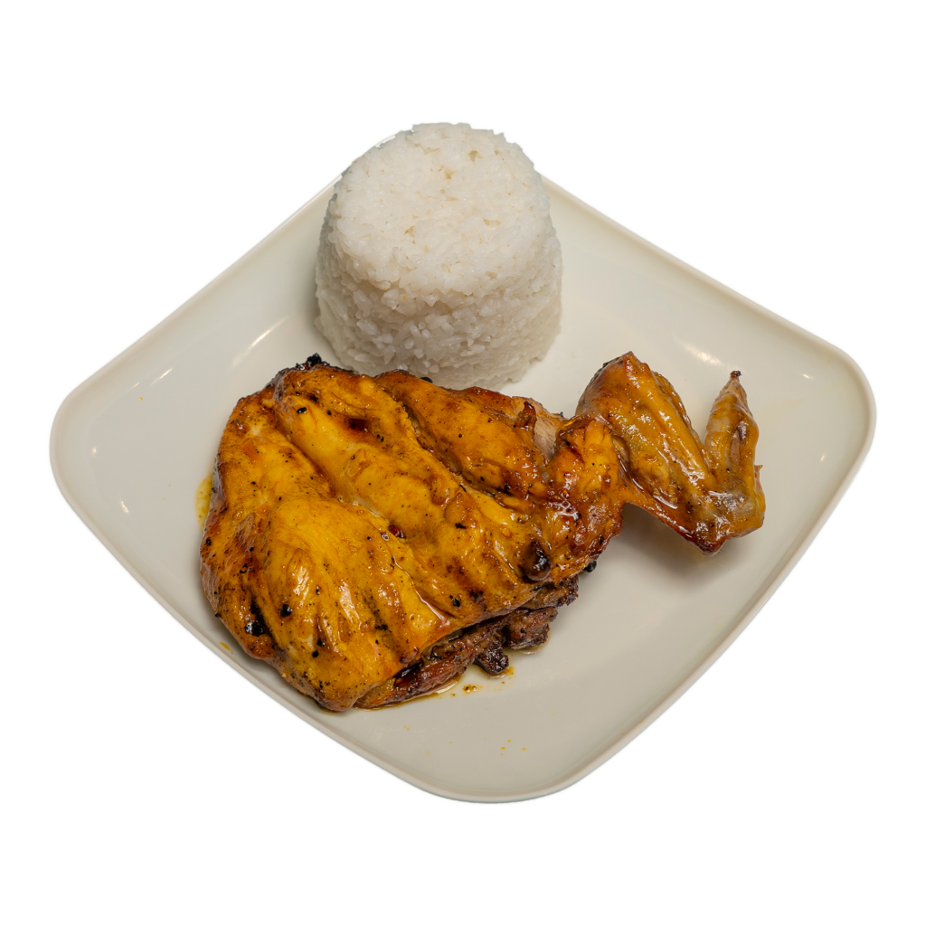 A piece of pecho chicken inasal and a cup of rice on a white plate.