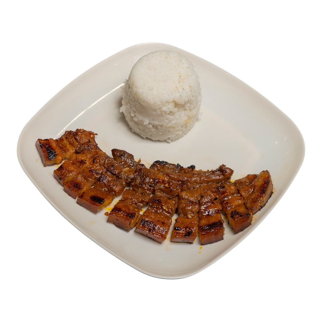 Pork liempo and a cup of rice on a white plate.